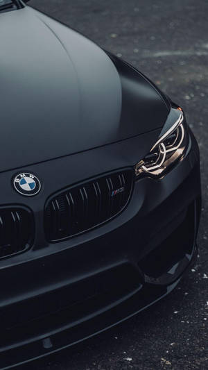 啞光黑色BMW M3跑車在人行道上亮起車頭燈。 — 最佳黑暗 壁紙