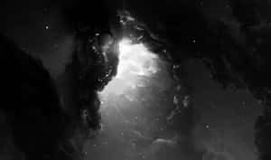 黑暗星雲拱門框住了太空中明亮的星域。 — 高解析度桌面 壁紙