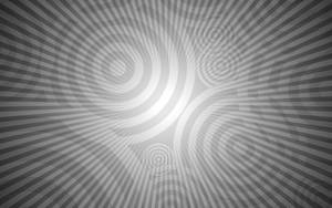 抽象灰色和白色螺旋線條，營造出催眠視覺效果。