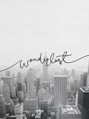 黑白城市景觀，覆蓋草書文字 'wanderlust'。 — 紐約 壁紙