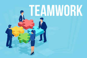 四位商業專業人士圍繞teamwork這個詞組裝色彩繽紛的拼圖塊。 — 團隊合作 壁紙