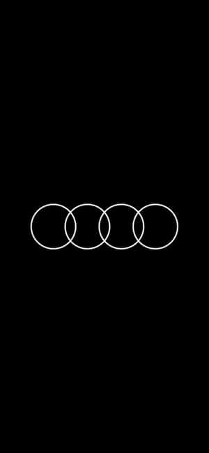 黑色背景上的四個相互交織的白色圓環 Audi 標誌 — Galaxy A37 壁紙