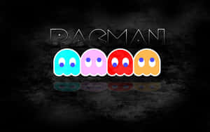 四個 Pac-Man 鬼魂，分別為青色、粉紅色、紅色和橙色，上方有 Pac-Man 標誌。 — 洛米安傳奇 壁紙