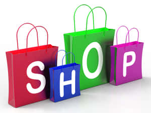四個鮮豔的購物袋排列成SHOP字樣。 — 購物 壁紙