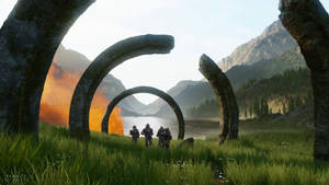 四個身穿盔甲的士兵站在草地上巨大的石環前，背景有山和火焰。 — 天命 4K 壁紙