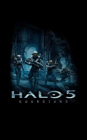 四名身穿盔甲的Halo士兵在黑暗廢墟中手持武器。 — 最後一戰：無限 4K 壁紙