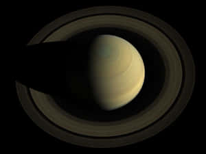 土星帶有環在太空中投下陰影 — 土星 壁紙
