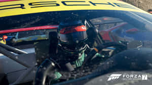 在Forza Motorsport 7比賽期間，雪覆蓋的保時捷中的賽車手。 — 極限競速7 壁紙