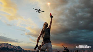 PUBG玩家在日落時分，飛機在雪山上空下降時舉起信號彈。