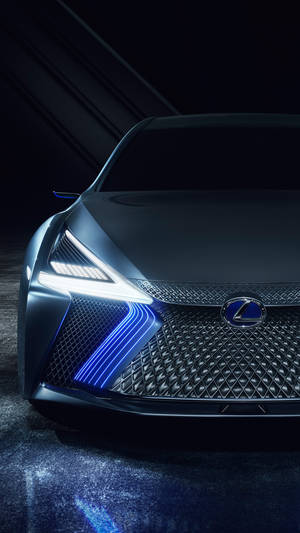 未來感 Lexus 汽車的特寫，配備發光的藍色車頭燈和格柵。 — 凌志 壁紙