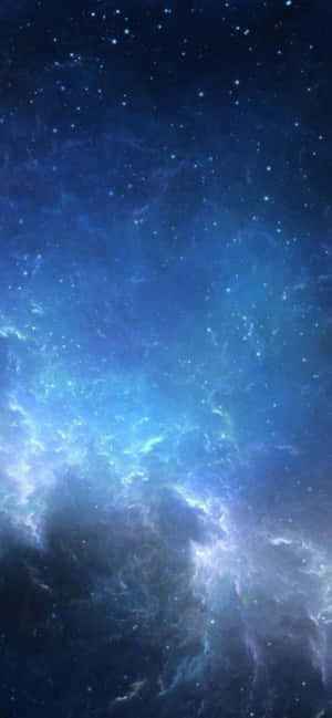 在深空中充滿星星的發光藍色星雲。 — 自然 iPhone 壁紙