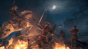 月光下，火焰中的鎧甲戰士和馬匹的夜間戰鬥場景。 — Studio Display 壁紙