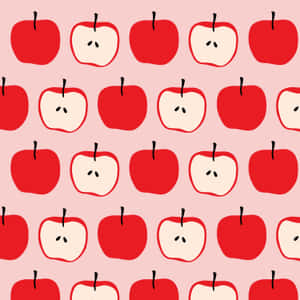 紅色完整和切片蘋果在粉紅色背景上以重複圖案排列。 — iPad Pro 13 壁紙