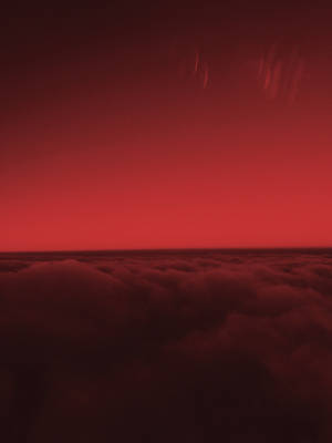 暮色中無盡雲海上的紅色天空 — 雲朵 GIF 壁紙