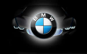 BMW汽車標誌，車頭燈在黑暗中發光。 — Vans 標誌 壁紙