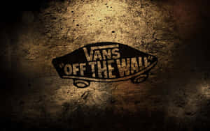 Vans Off The Wall標誌在帶有紋理的混凝土牆上，具有聚光燈效果。 — 滑板 GIF 壁紙