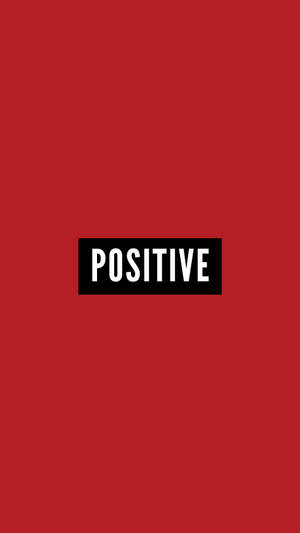 紅色背景，黑色矩形內含白色文字「positive」 — 正向 壁紙