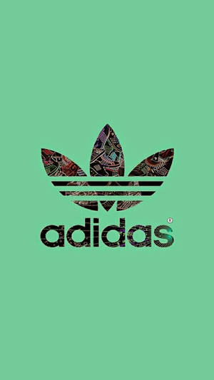 在薄荷綠色背景上充滿部落設計的Adidas標誌。 — 品牌 壁紙