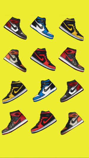 十雙不同配色的Air Jordan 1運動鞋在黃色背景上以網格排列。 — Jordan球鞋 壁紙