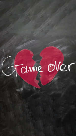 破碎的紅色心形，黑板上有game over文字。 — 心碎 壁紙