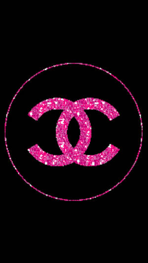 黑色背景上圓圈內的粉紅色閃粉 Chanel 標誌。 — 香奈兒標誌 壁紙