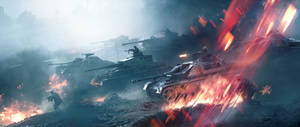 坦克和士兵在煙霧和爆炸中於燃燒的戰場上戰鬥。 — 2560x1080 壁紙