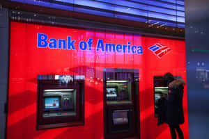 夜晚在Bank of America分行使用ATM的人。 — 一护卍解 壁紙