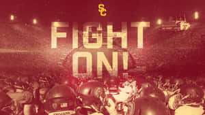 夜晚在球場上「FIGHT ON!」文字下聚集的足球球員。 — 運動 壁紙