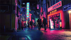 夜晚的東京街道，霓虹燈招牌和行人在繽紛燈光下。 — 東京 壁紙