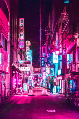 夜晚霓虹燈照亮的東京小巷，有發光招牌和腳踏車。 — Huawei MatePad Edge 壁紙