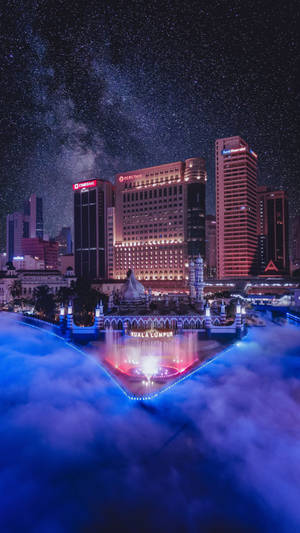星空下，燈火通明的建築和發光的噴泉構成的夜景。 — 拉斯維加斯之夜 壁紙
