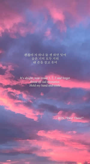 粉紅和紫色的日落天空，帶有BTS Two Three的歌詞 — 孤獨悲傷 壁紙
