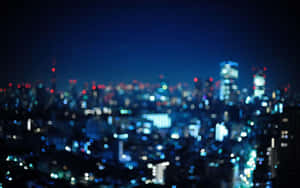 夜間城市景觀，模糊的燈光營造出散景效果。 — 霓虹燈 壁紙