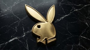 金色Playboy兔仔標誌在黑色大理石背景上 — 花花公子 GIF 壁紙