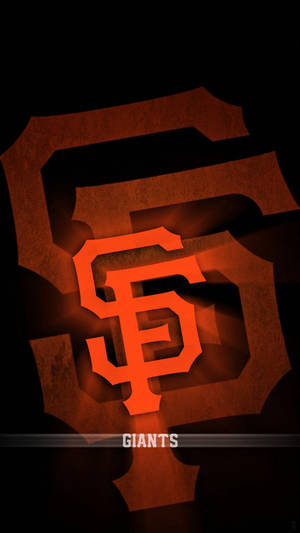 SF Giants棒球隊標誌在深色背景上以橙色發光。 — 舊金山巨人隊 壁紙
