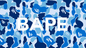 帶有鬼臉和白色BAPE標誌的藍色迷彩圖案。 — BAPE 標誌 壁紙