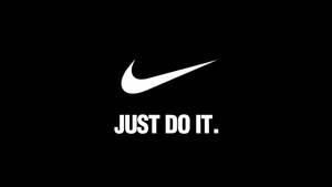Nike標誌及標語'JUST DO IT'在黑色背景上。 — Off white 標誌 壁紙