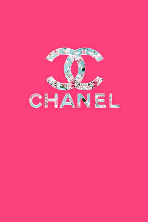 粉紅色背景上帶有花卉圖案的Chanel標誌 — 美學粉色GIF 壁紙