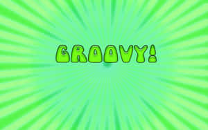 在數位背景上帶有向外輻射條紋的充滿活力的綠色「GROOVY!」文字。 — 16:10 壁紙