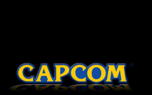 黃色和藍色的 Capcom 標誌，在黑色背景上帶有倒影 — 卡普空 壁紙