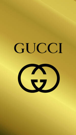 Gucci標誌和互鎖G標誌在金色漸變背景上。 — 舊金山 iPhone 壁紙
