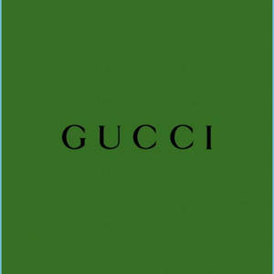 綠色背景上的黑色Gucci標誌