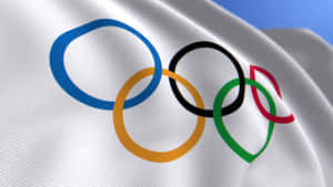 奧運五環在藍天下於白色旗幟上飄揚 — 奧運 壁紙