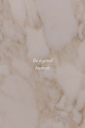 奶油色大理石背景，上面有文字 be a good human。 — Huawei MatePad Air (2025) 壁紙