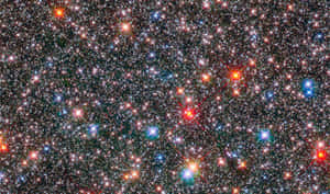 密集的彩色星星在黑暗宇宙背景下。 — 宇宙 壁紙