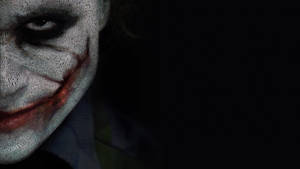 小丑臉部特寫，白色化妝和紅色嘴唇。 — 小丑 2019 壁紙