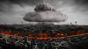 核爆炸的蘑菇雲懸浮在黃昏時燃燒的城市上空。 — 煙動圖 壁紙