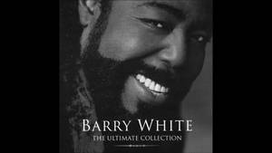巴里·懷特在專輯封面上微笑，文字為The Ultimate Collection — 白色抽象 壁紙