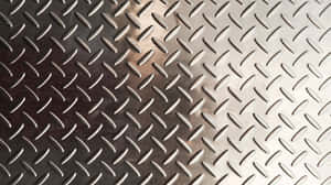 帶有反射銀色表面的鑽石板金屬紋理特寫。 — 金屬質感 壁紙