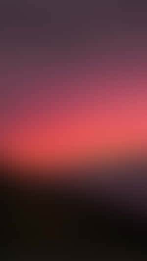 帶有紫色、紅色和深色調的抽象漸層天空 — 悟空黑 iPhone 壁紙